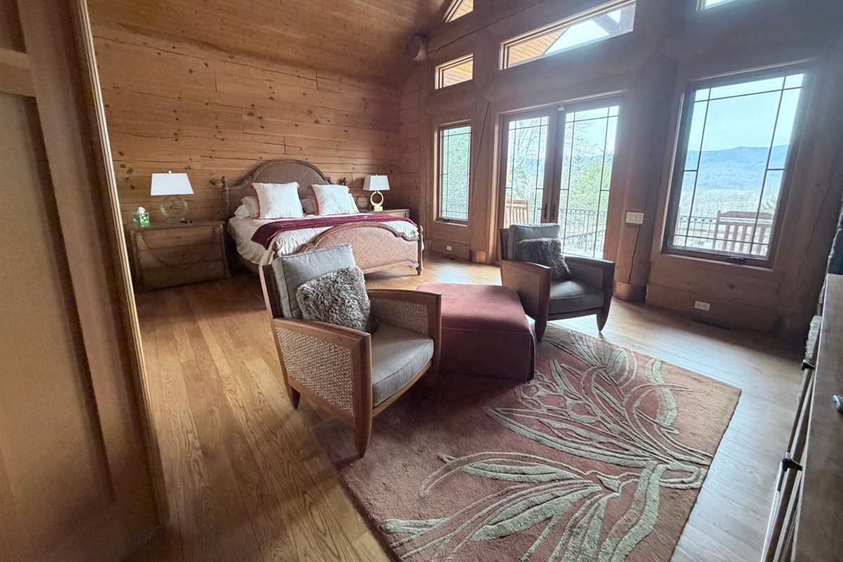 Master bedroom with a king bed