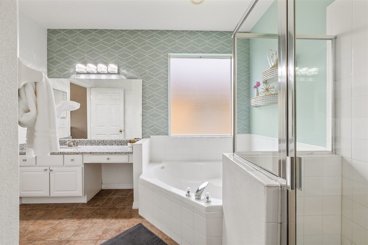 Spacious Bathroom with Jacuzzi and Walk In Shower