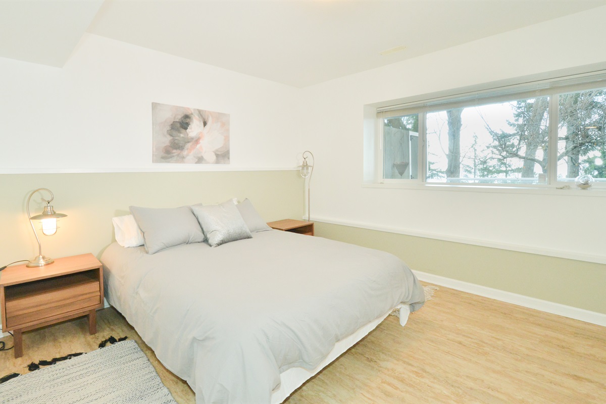 Queen bedroom 1 – bright and private