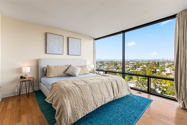 The views! Wake up in comfort in your king bed in the master bedroom