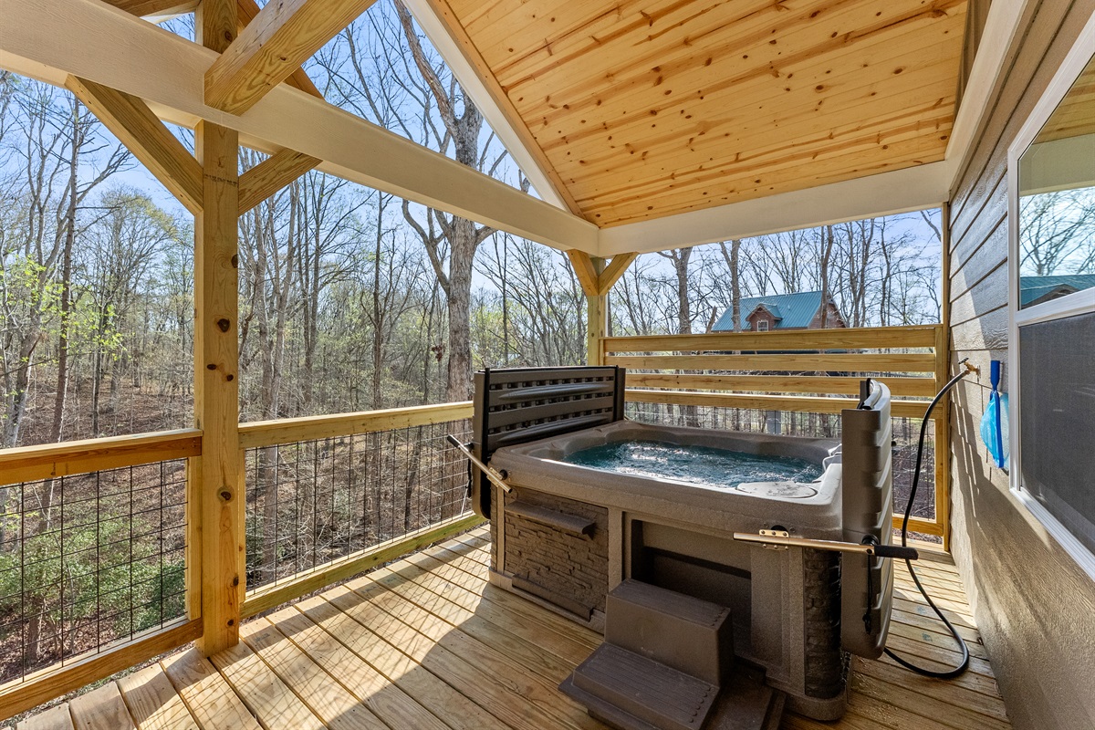 Soak in the Hot Tub and Enjoy the Peaceful Scenery