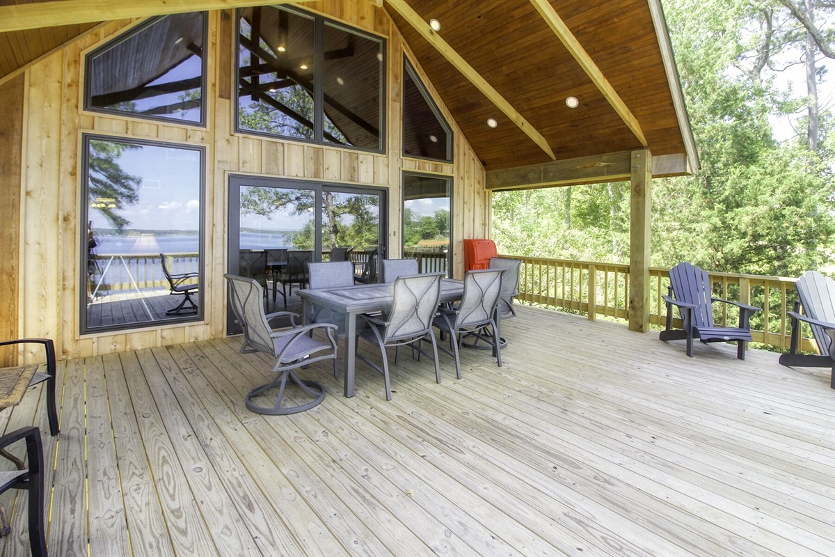 Deck looking back to house. Dining for 6 plus additional seating. Charcoal Grill