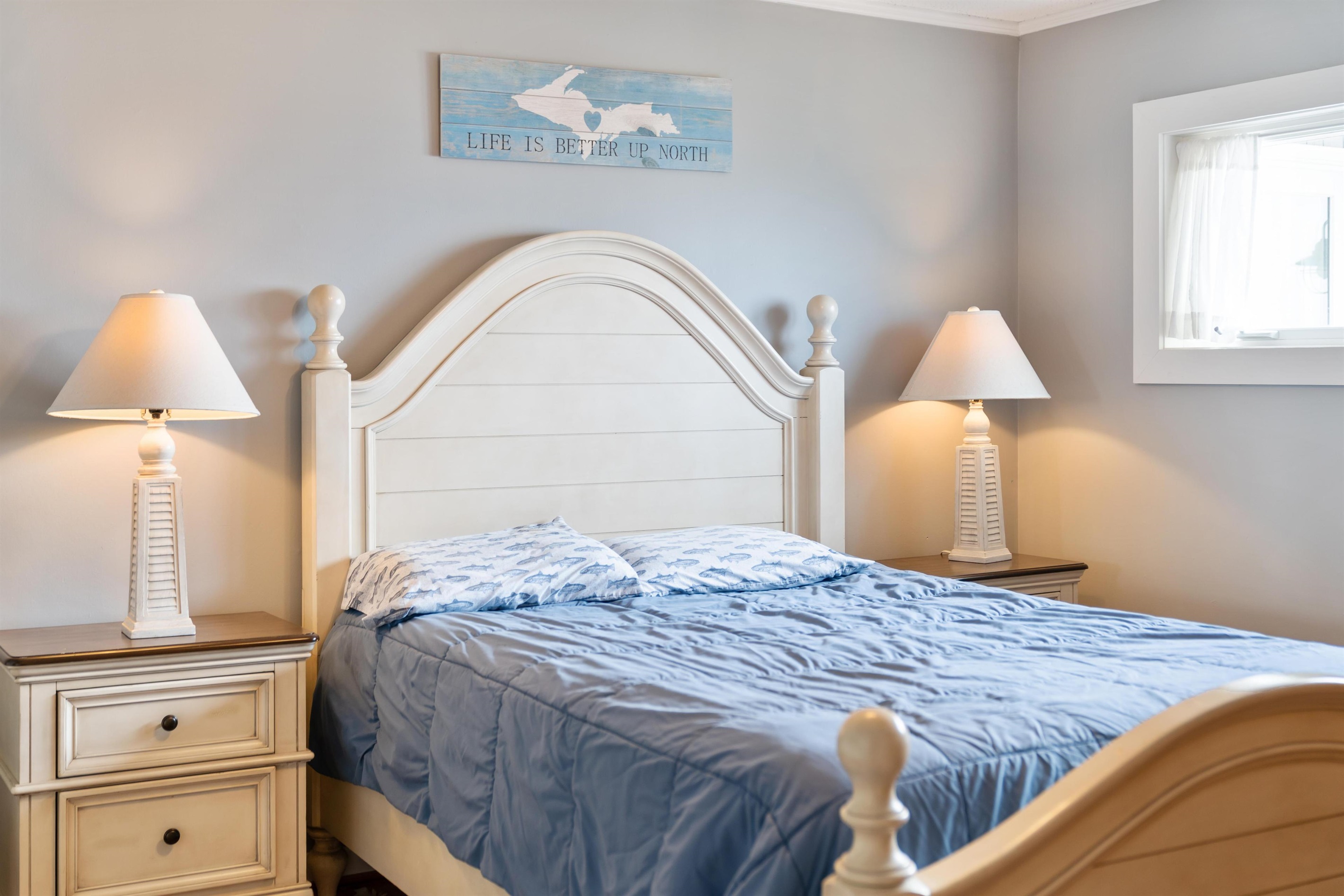 Bedroom 1 has great lighting, comfy bed, and large closet