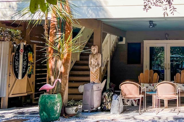 Outdoor steps lead to elevated main living spaces!