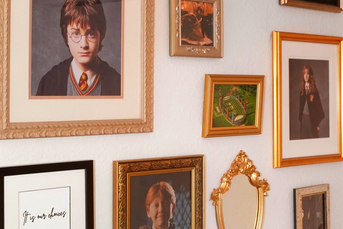 Harry Potter Themed Bedroom: A whimsical display of framed art that sparks joy and nostalgia.

