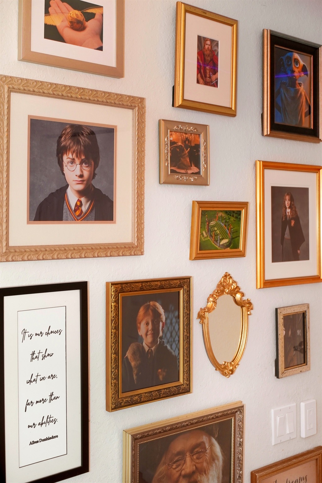 Harry Potter Themed Bedroom: A whimsical display of framed art that sparks joy and nostalgia.

