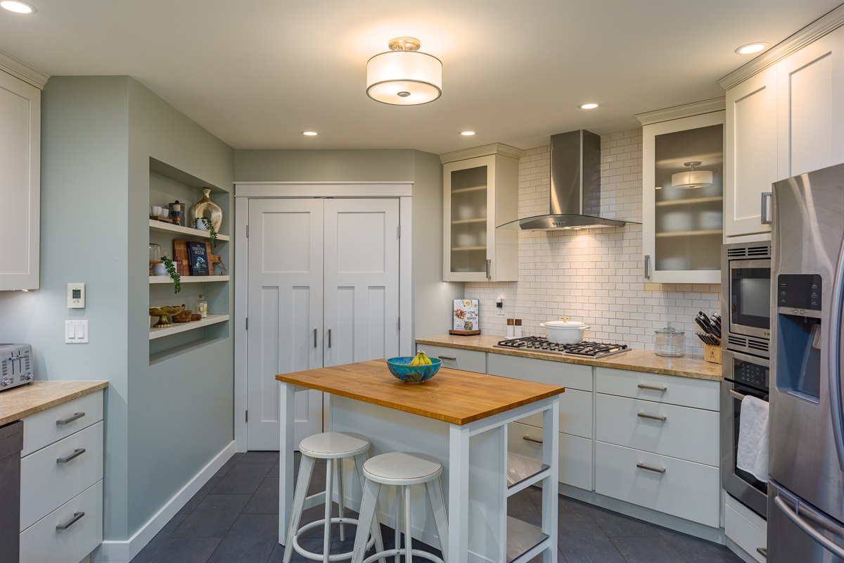 Island seating is the perfect perch for coffee or meals while adding extra counter space for food prep.