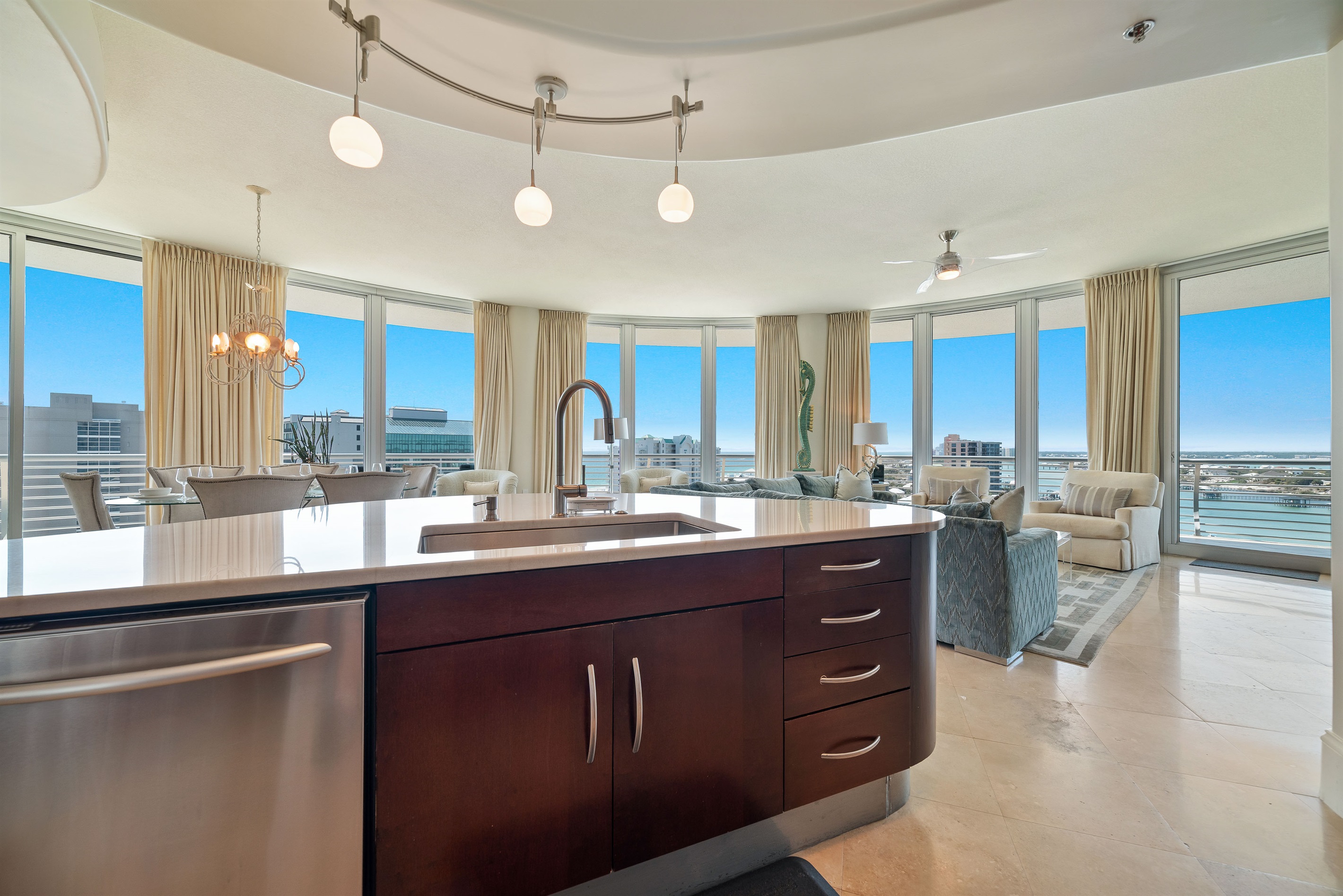 This well-designed kitchen boasts rich wood cabinetry, granite countertops, and stainless steel accents. The open layout ensures a seamless transition to the living and dining areas, creating a perfect space for gatherings.