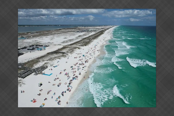 Sugar-white sand and emerald-green Gulf waters — Navarre Beach is one of Florida's best-kept secrets.