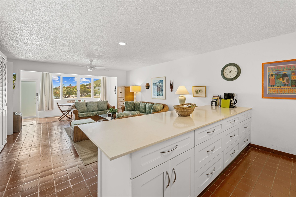 The kitchen with the large island will definitely be a place your group will congregate around.