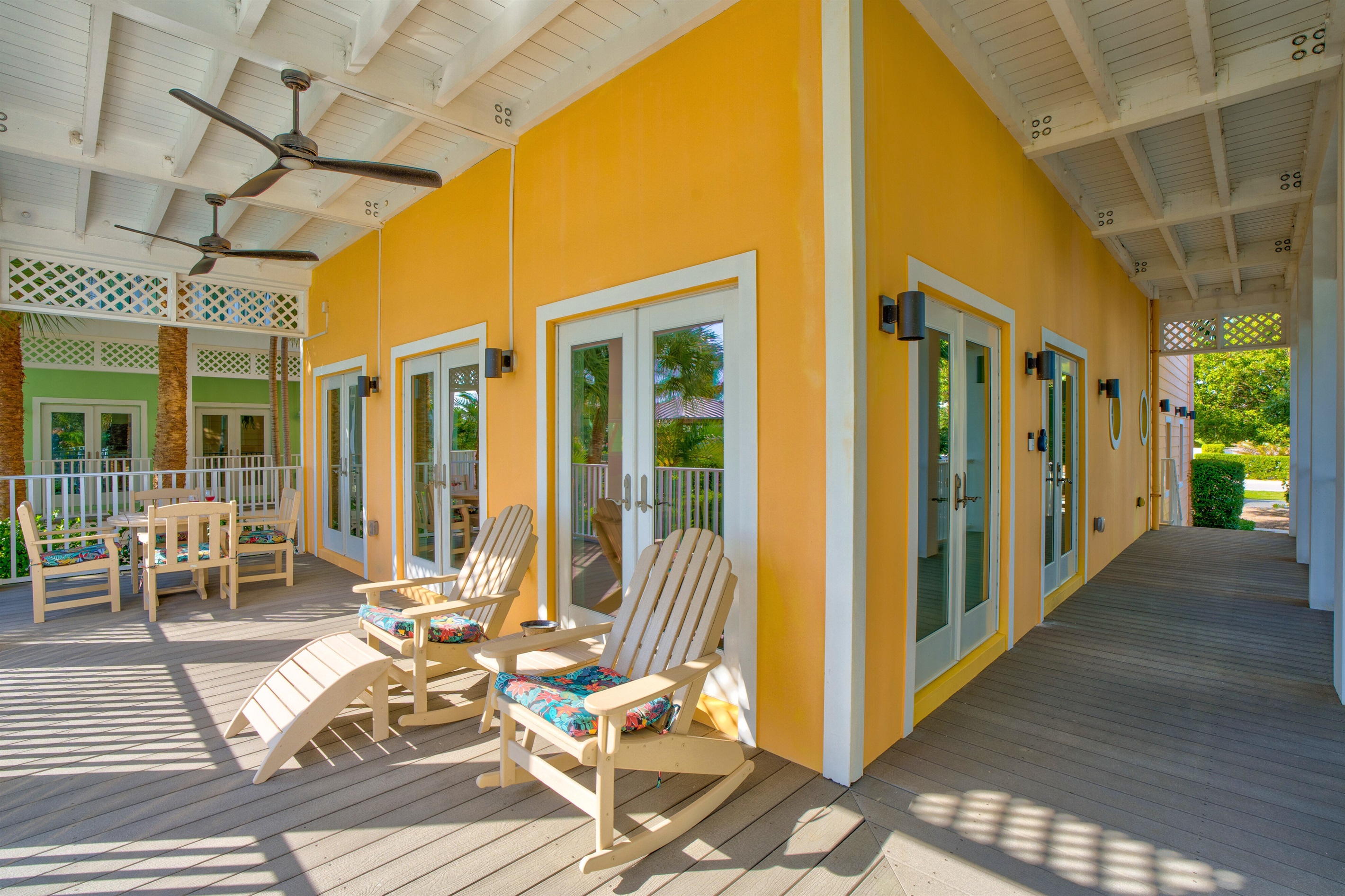 The covered porch wraps around the house on both levels to provide plenty of space to enjoy the view, even if it's raining.