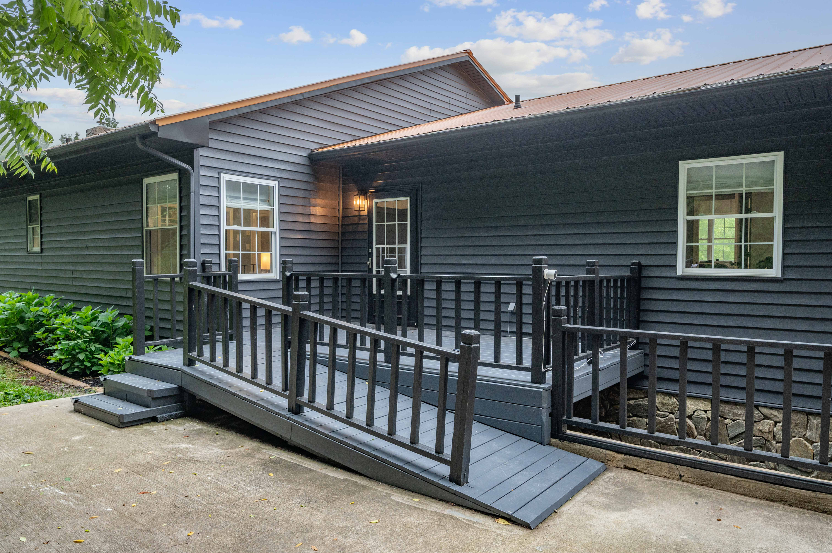 Exterior Entryway: Welcoming porch with easy access—perfect for your mountain adventure!