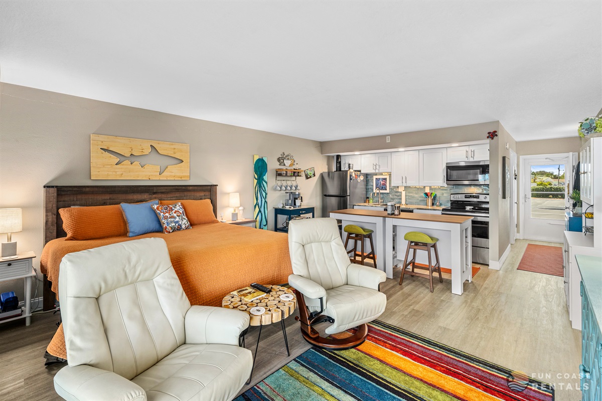King Bed and Living Room Area