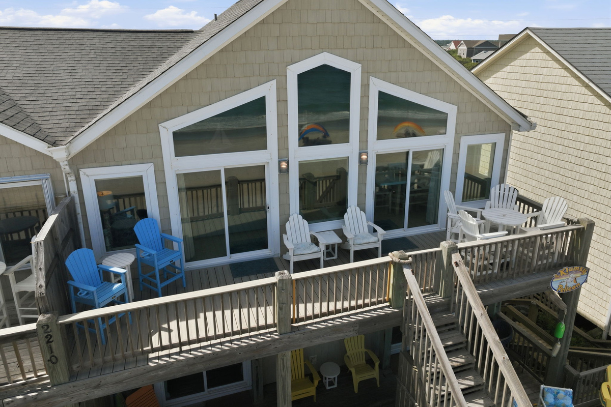 Side deck relaxation area with chairs and ocean breeze setting