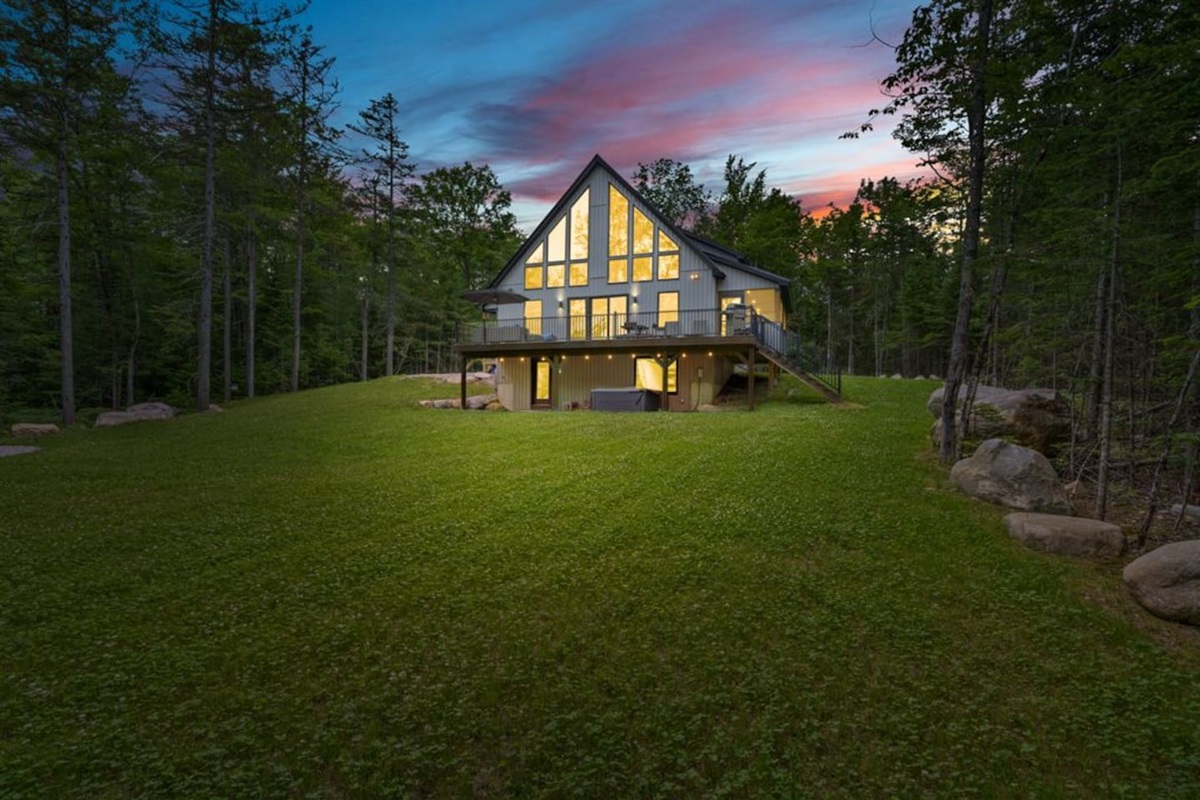 Golden hour at Basecamp  After a day of hikes, paddles, or porch lounging, this is your view. Light the fire, grab a local cider, and let the stillness sink in