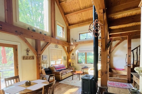 Post and Beam construction, light filtering in through the large windows