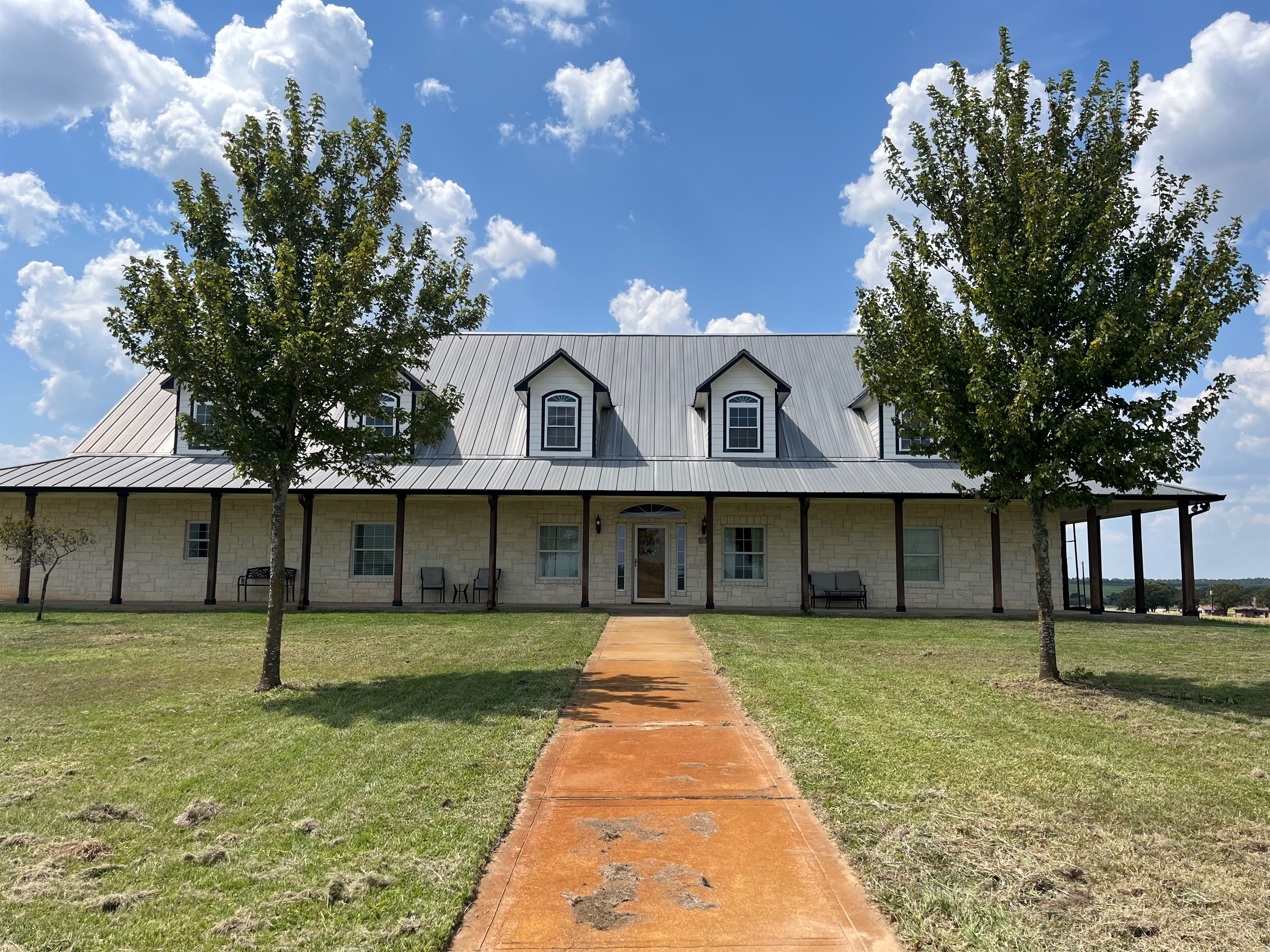 Front of Harvest Lodge. Wrap around porch.