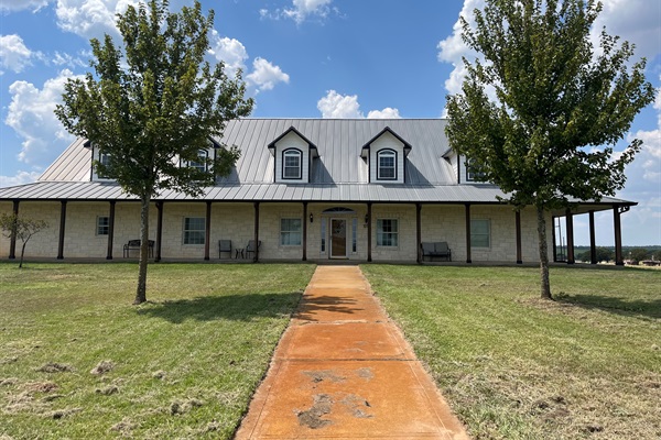 Front of Harvest Lodge. Wrap around porch.