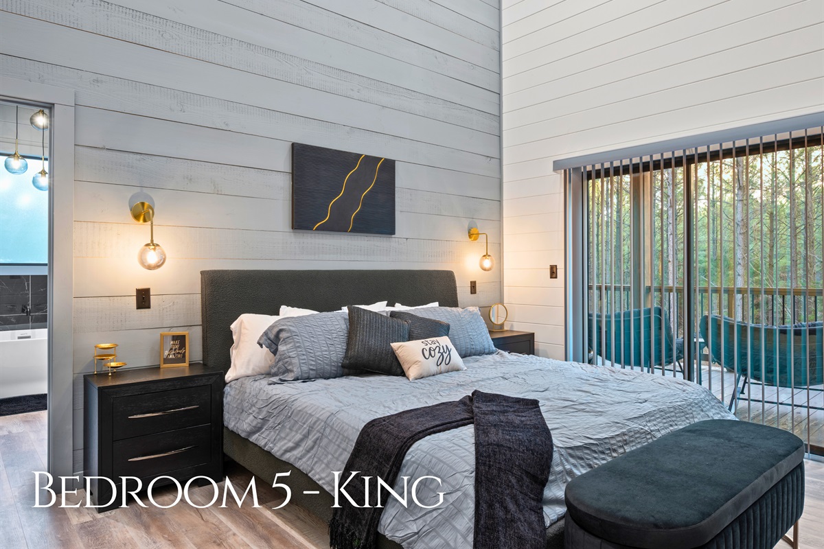 With cozy seating and warm lighting, this king bedroom offers a comfortable place to relax whether you’re reading, watching TV, or getting ready for bed.