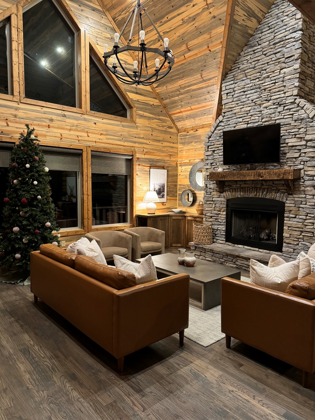Warm wood interiors, stone fireplace, and soft natural light — your Hochatown cabin retreat starts here.