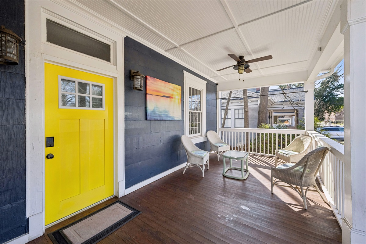 Comfortable front porch area with seating for 4