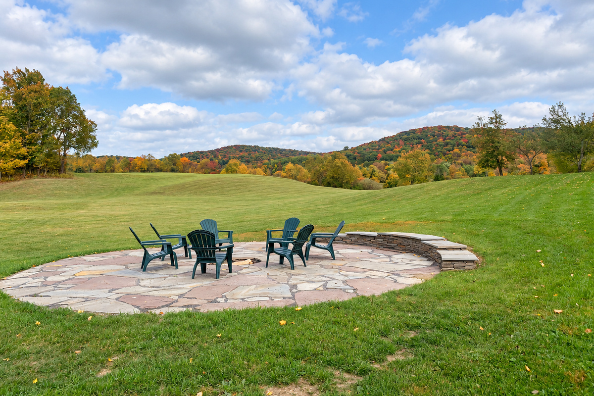 Unwind around the shared fire pit with peaceful views of the surrounding hills.