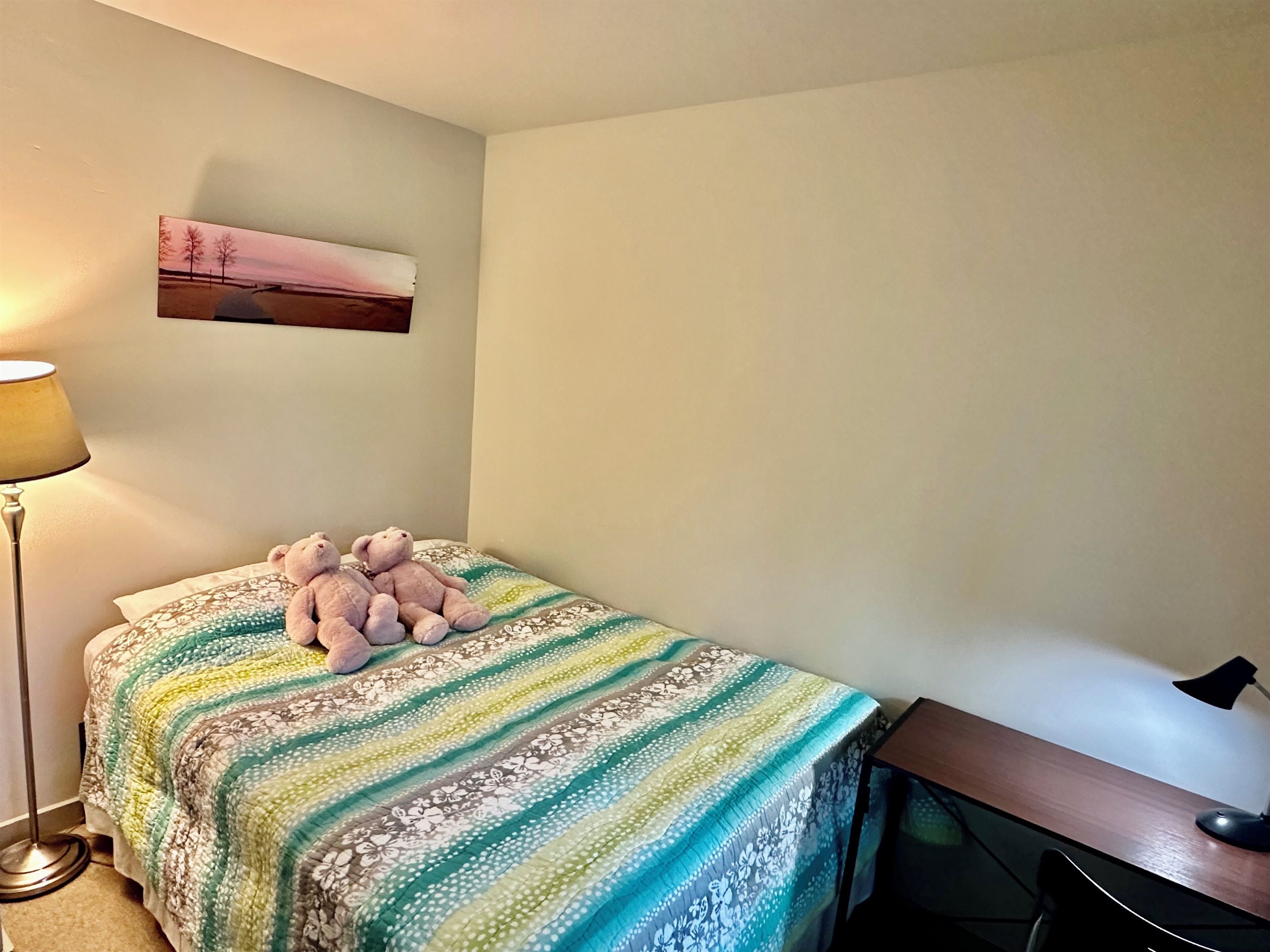 2nd guest room with queen bed and desk/chair