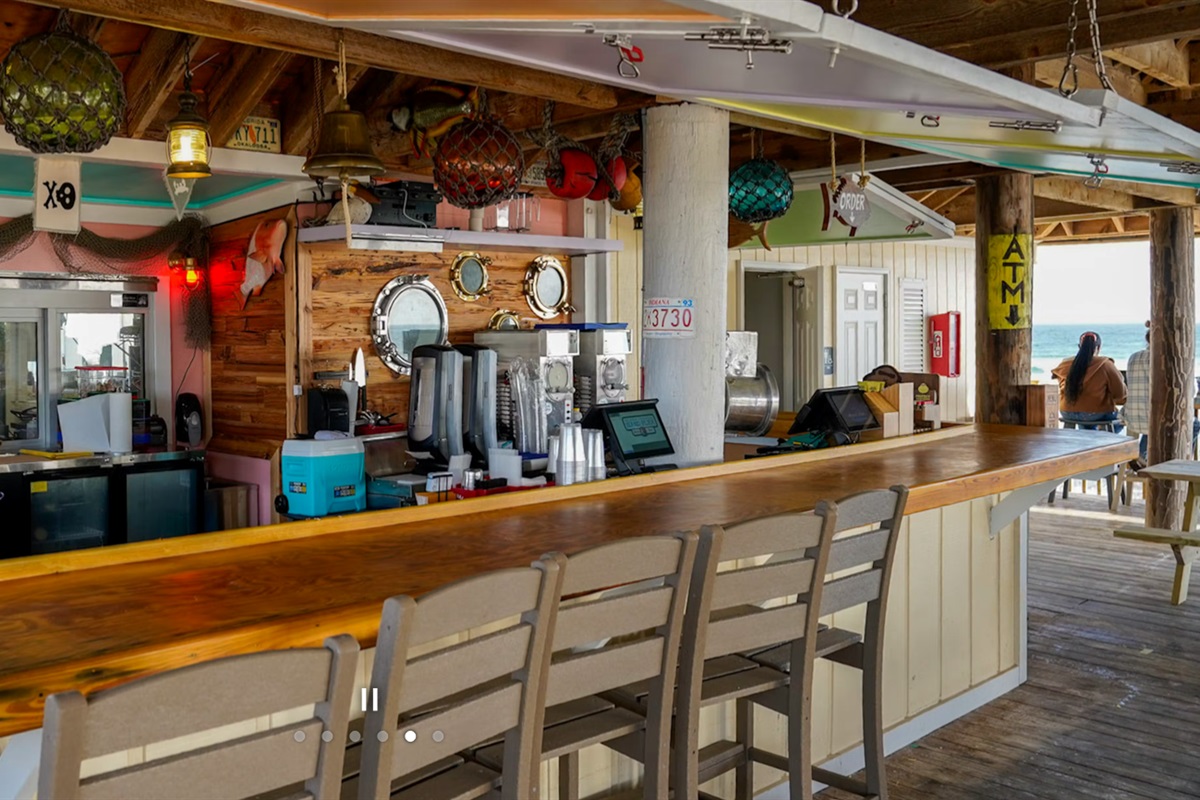 Sand Flea Beach Bar & Resturant.

https://www.sandfleadestin.com
