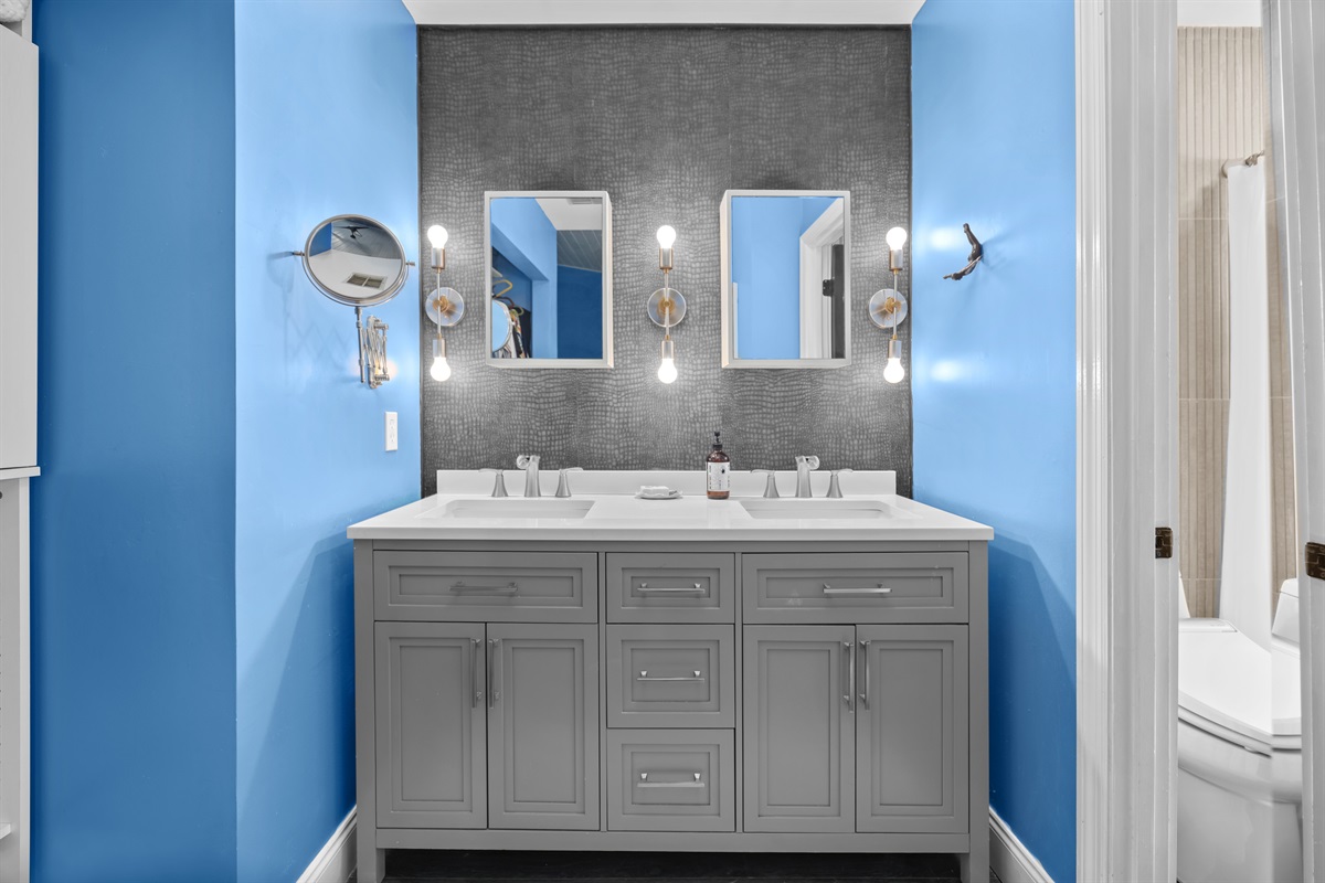 The primary ensuite bathroom features two sinks.