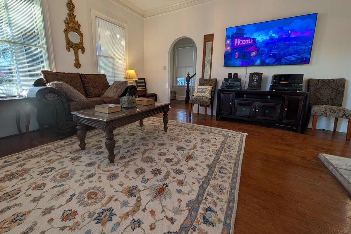 living room with 70" smart tv