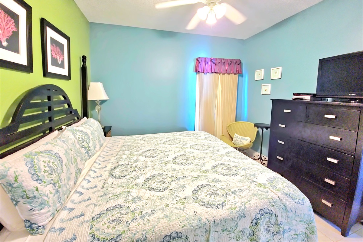 Second bedroom queen bed flat screen tv