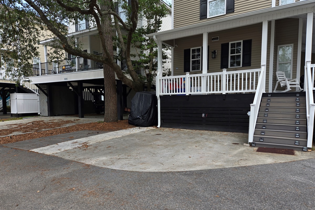Parking for 2 large vehicles here and One on the other side of the house.