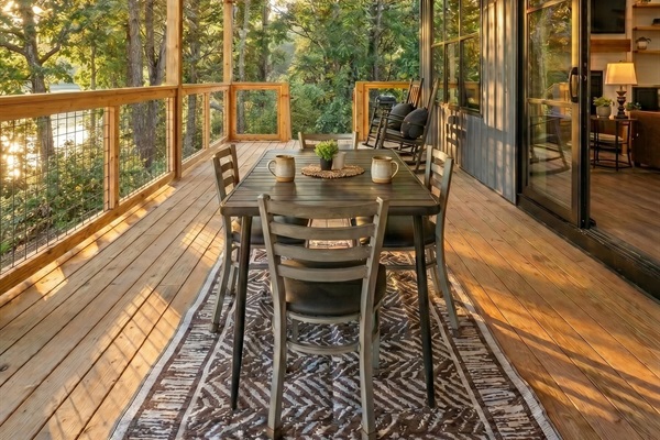Lakeside porch dining, the table most groups end up using for every meal of the trip.