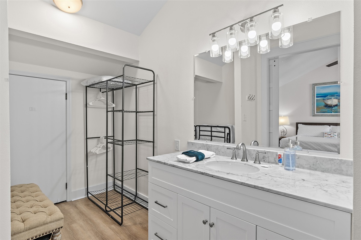 Master Bathroom (Level 3): Remodeled walk in shower, vanity, and large closet 