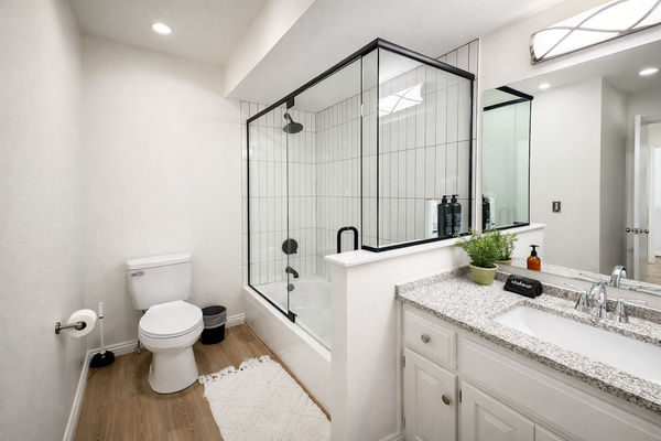 A modern bathroom with a glass shower — simple, clean, and comfortable.