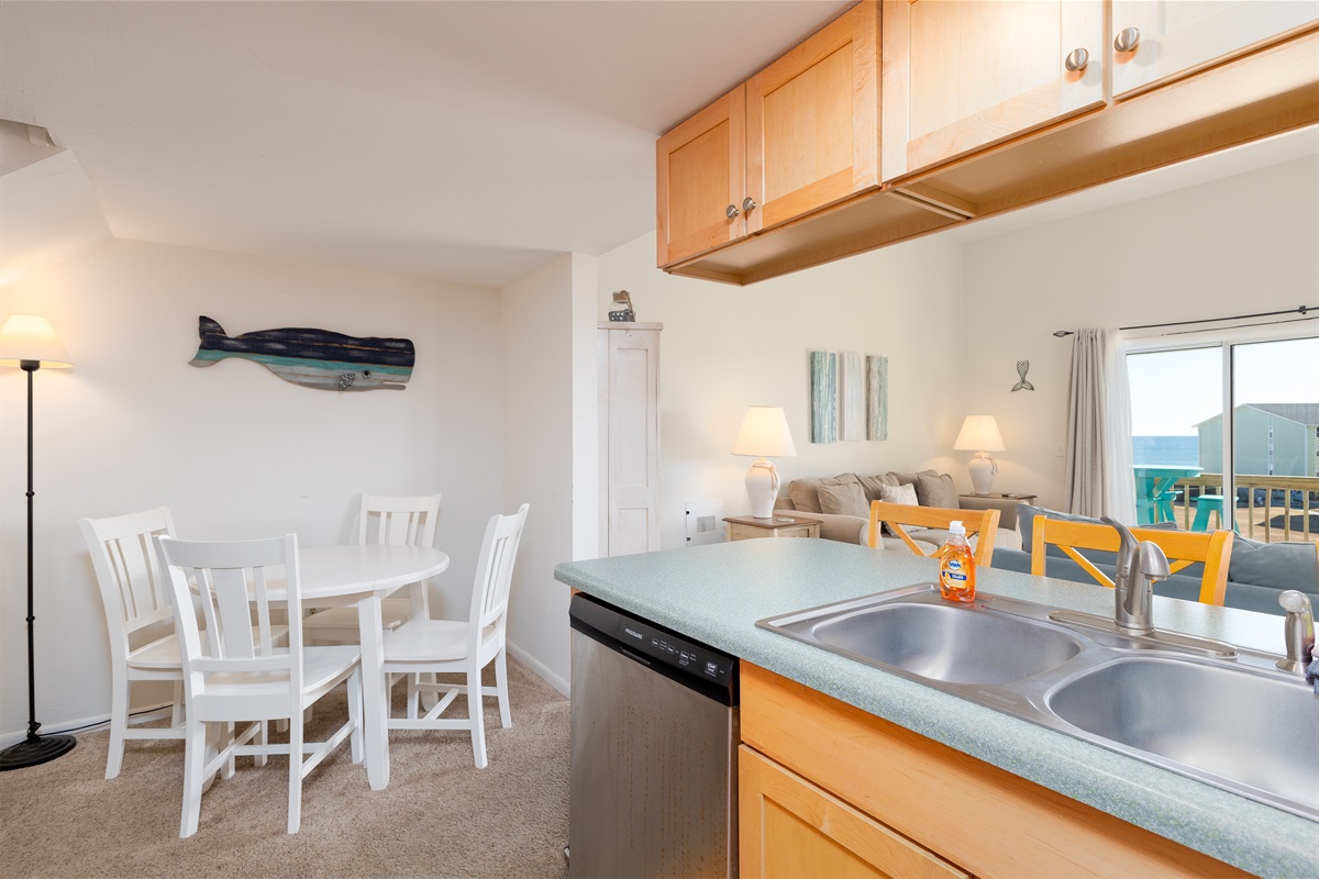 Coastal-themed decor complements the open layout