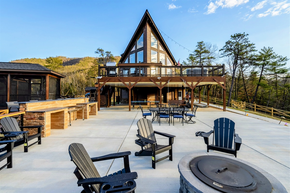 Patio Paradise – Lounge by the fire, grill dinner, and savor mountain views from this expansive outdoor living area.