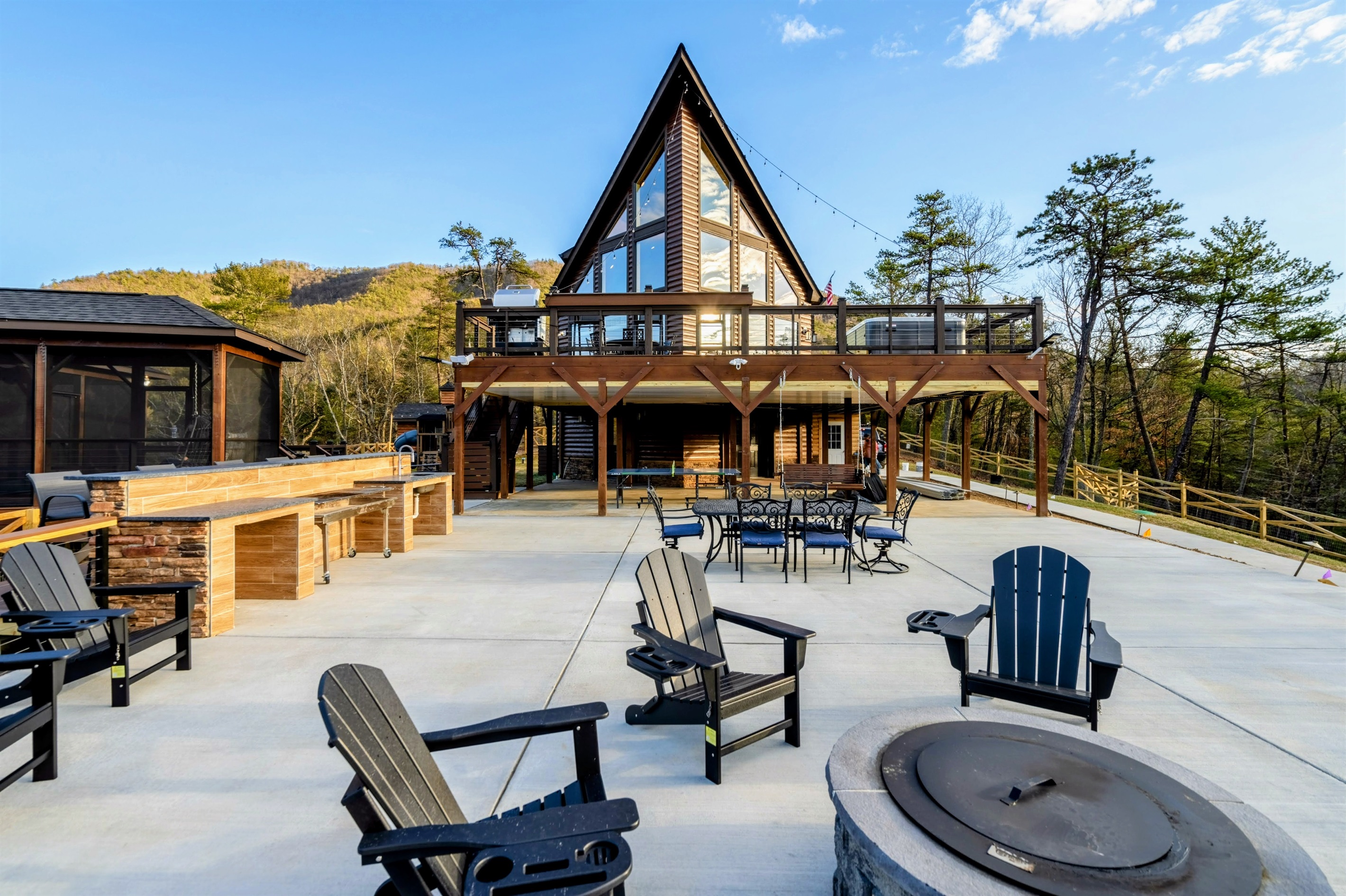 Patio Paradise – Lounge by the fire, grill dinner, and savor mountain views from this expansive outdoor living area.
