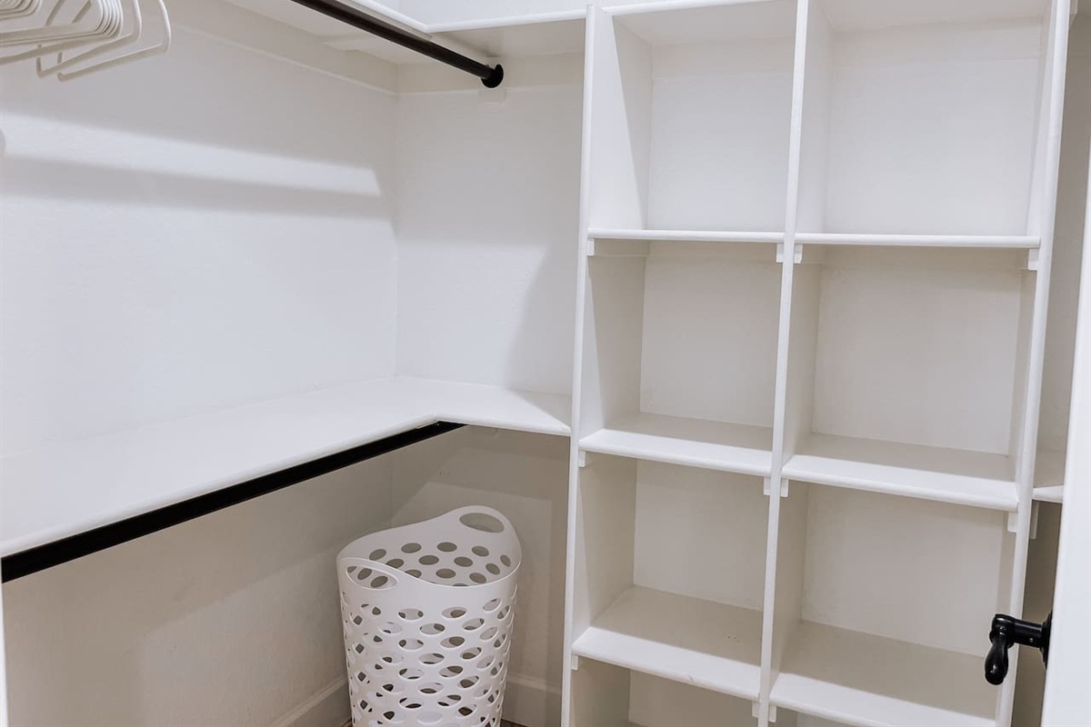 Master suite walk-in closet with ample storage