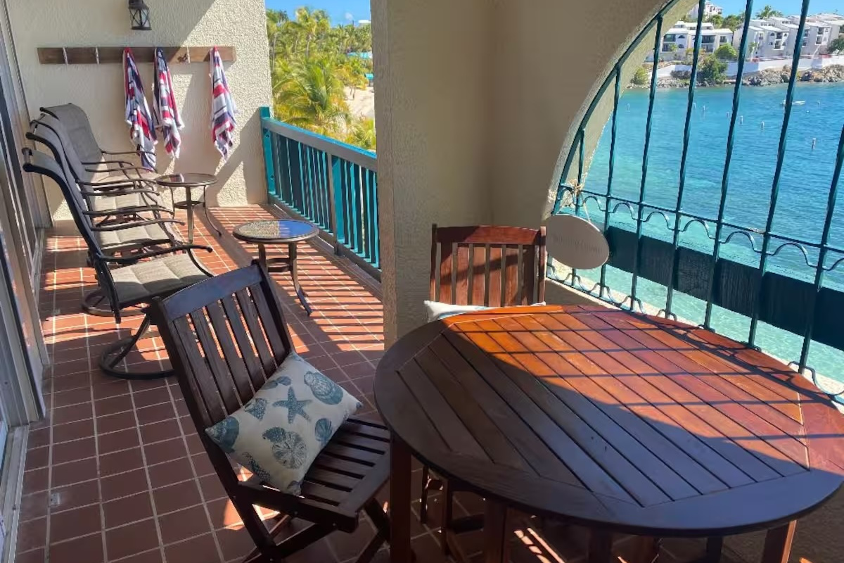 Dine al fresco while overlooking the turquoise Caribbean Sea.