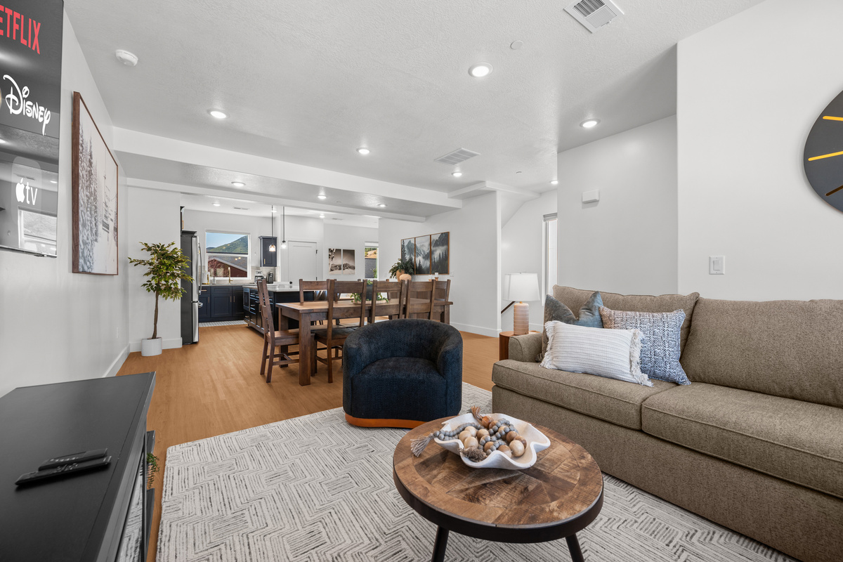 The open-concept living and dining spaces keep everyone connected while still offering plenty of room to spread out.