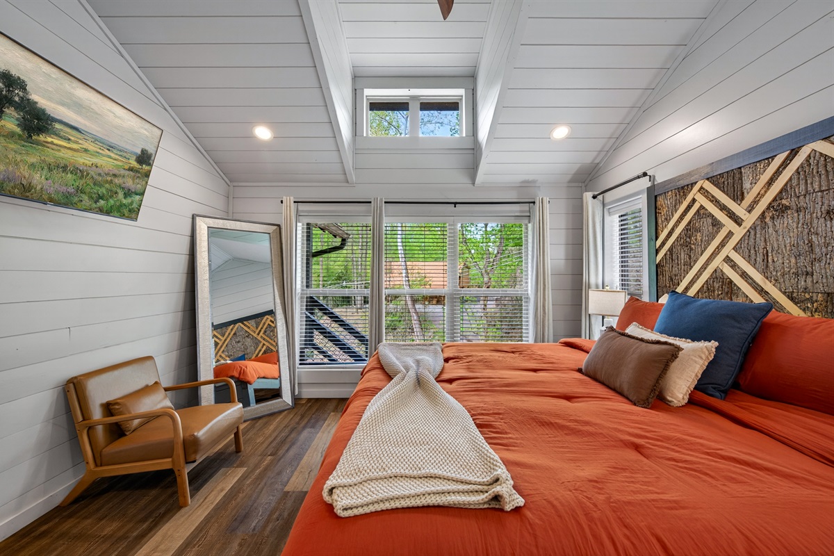 King size bed with TV.