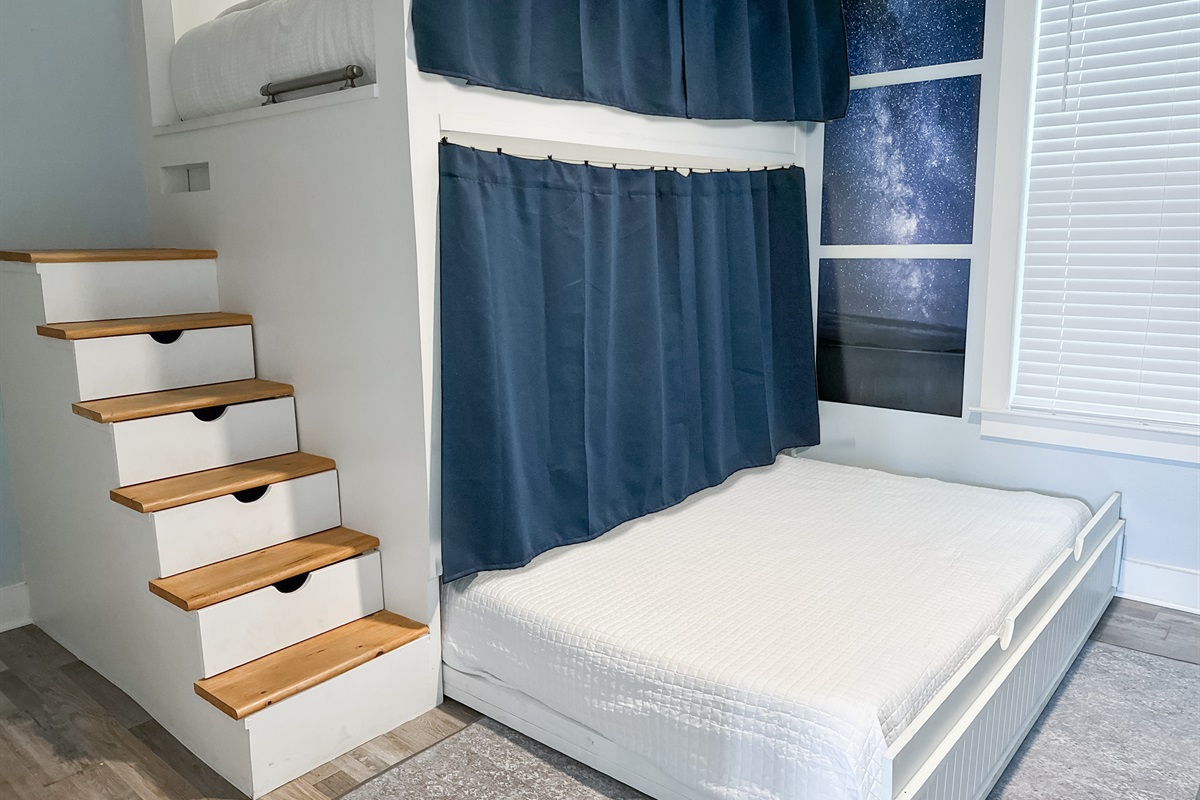 There is a trundle bed underneath for added sleeping space.