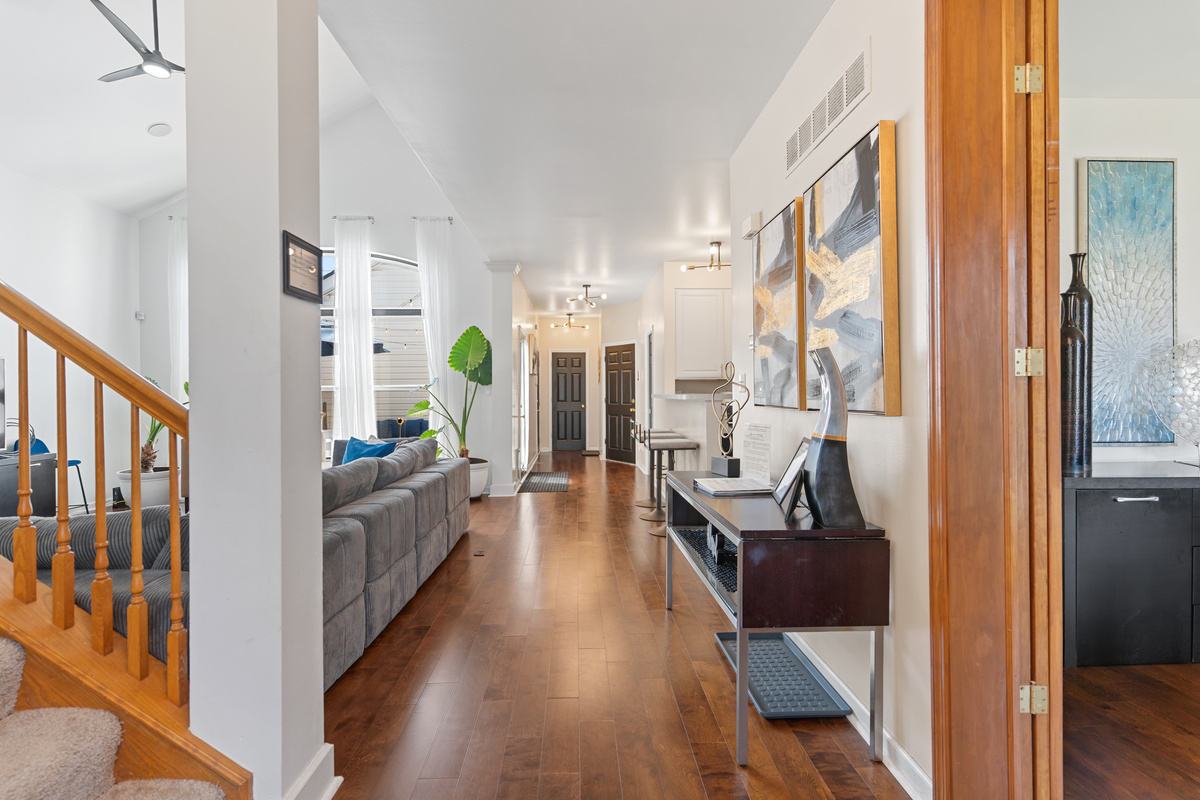 Step inside and feel right at home - this open-concept entry flows seamlessly into a spacious living room and kitchen, perfect for gathering and relaxing.