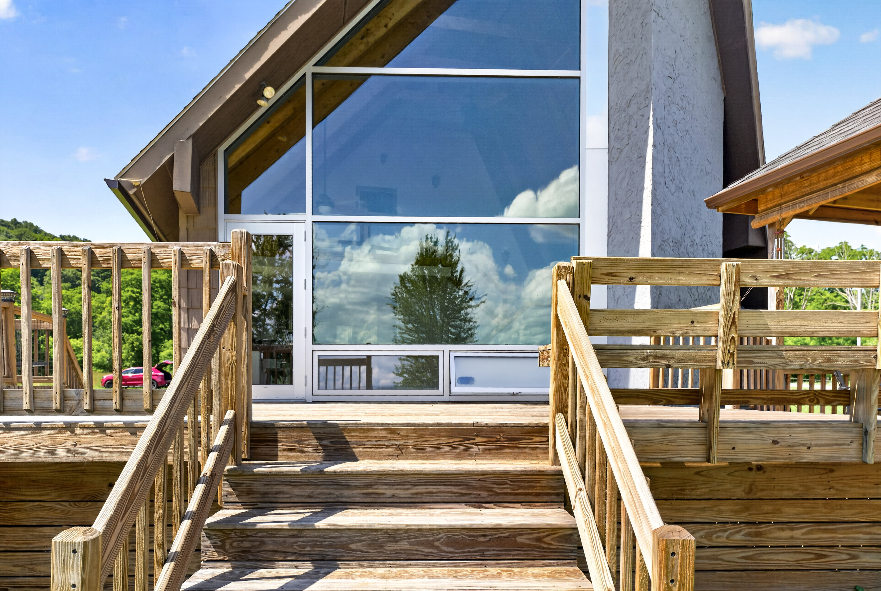 Exterior stairs leading to glass doors