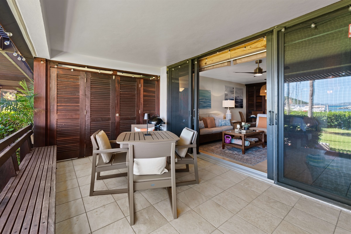 Feel like taking in the salt air while enjoying dinner? The bistro lights are on a timer that will kick them on at dusk and turn them off at the association mandated time.ti