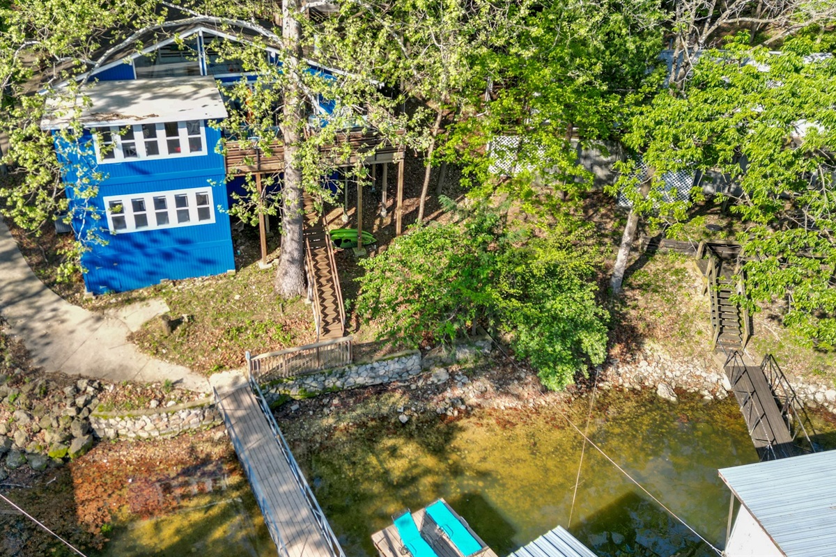 Your own slice of the lake, surrounded by trees and water.