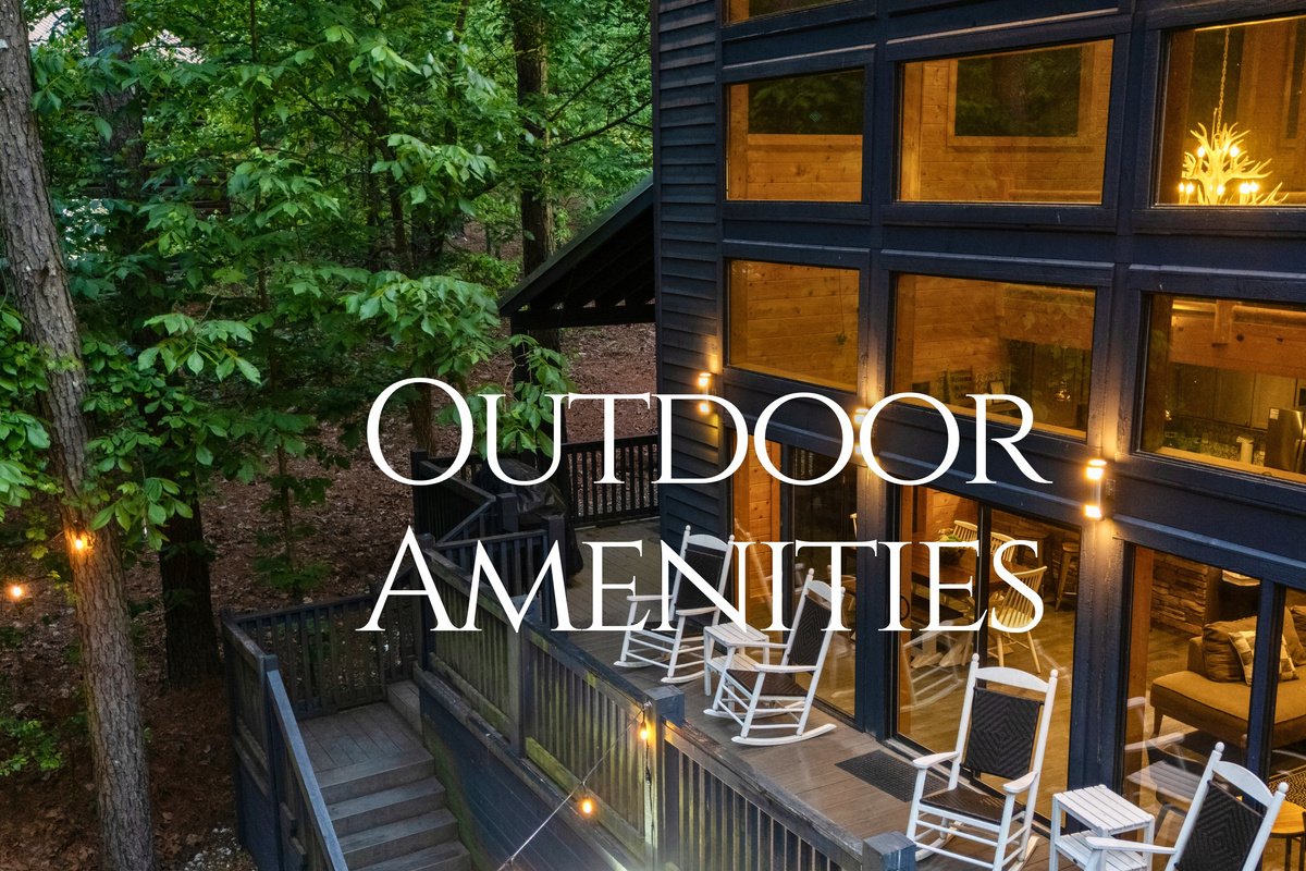 The exterior spaces blend seamlessly with the surrounding woods, creating a peaceful and natural setting.