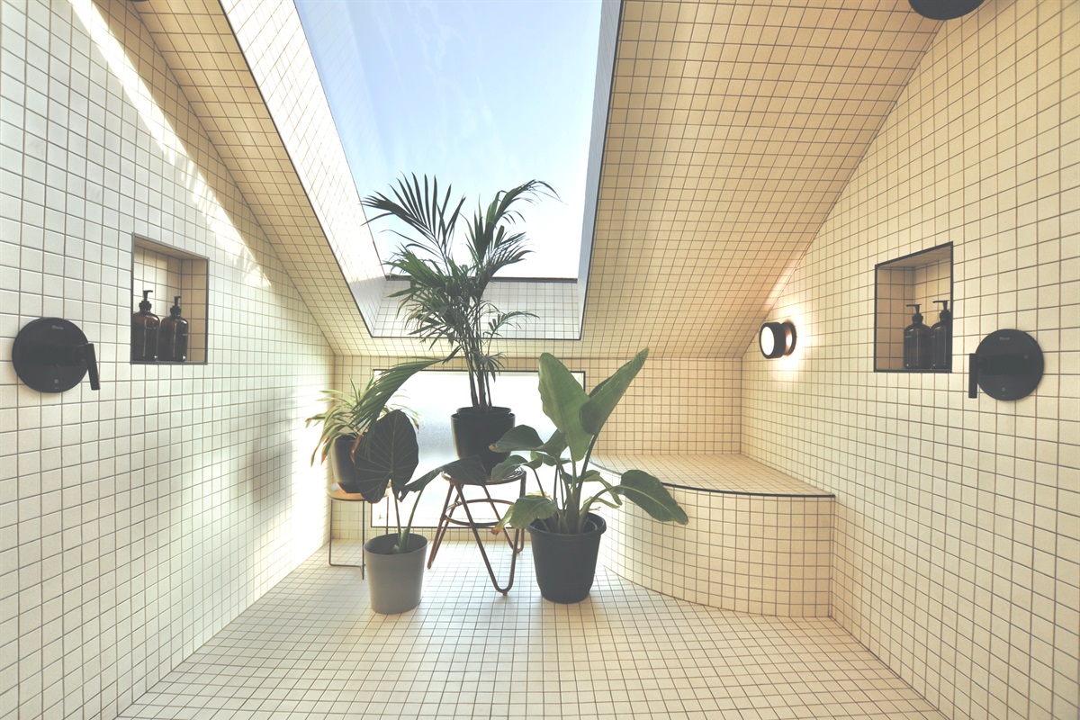 The shower has its own skylight.