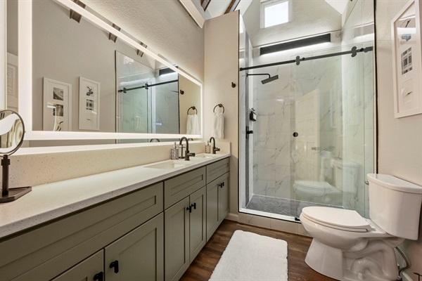 Enjoy the luxurious shower and cathedral ceiling in the Bedroom 1 ensuite